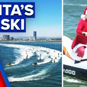 Santa swaps the snow for the sea | 9 News Australia