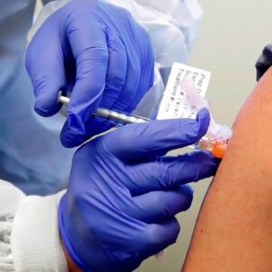 Medical staff in training to administer coronavirus vaccine