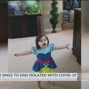 Girl sings to her dad who is isolated at home with COVID-19